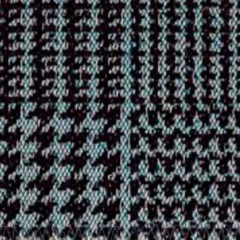 Woven fabric sample, houndstooth pattern, black, white, turquoise; dense twill weave with vertical striped color blocks and textured surface.